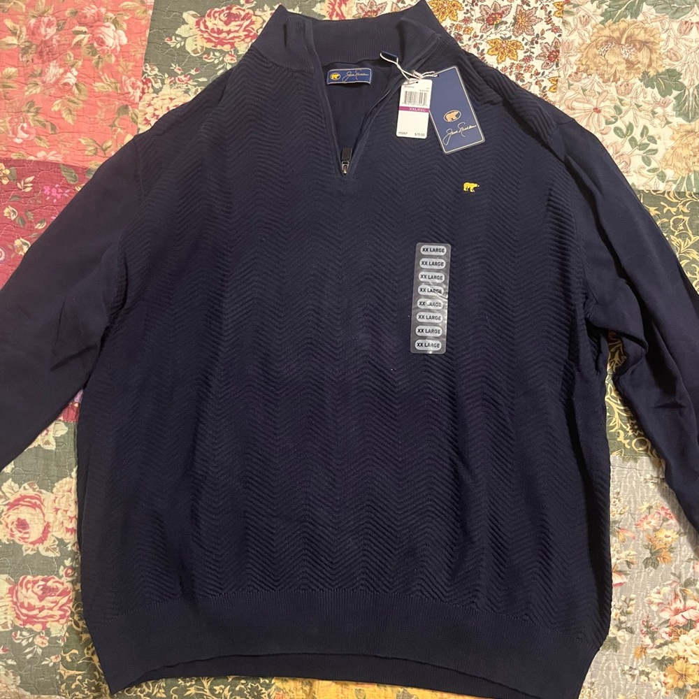 Never worn Jack Nicklaus navy blue quarter zip XXL new with tags still on.